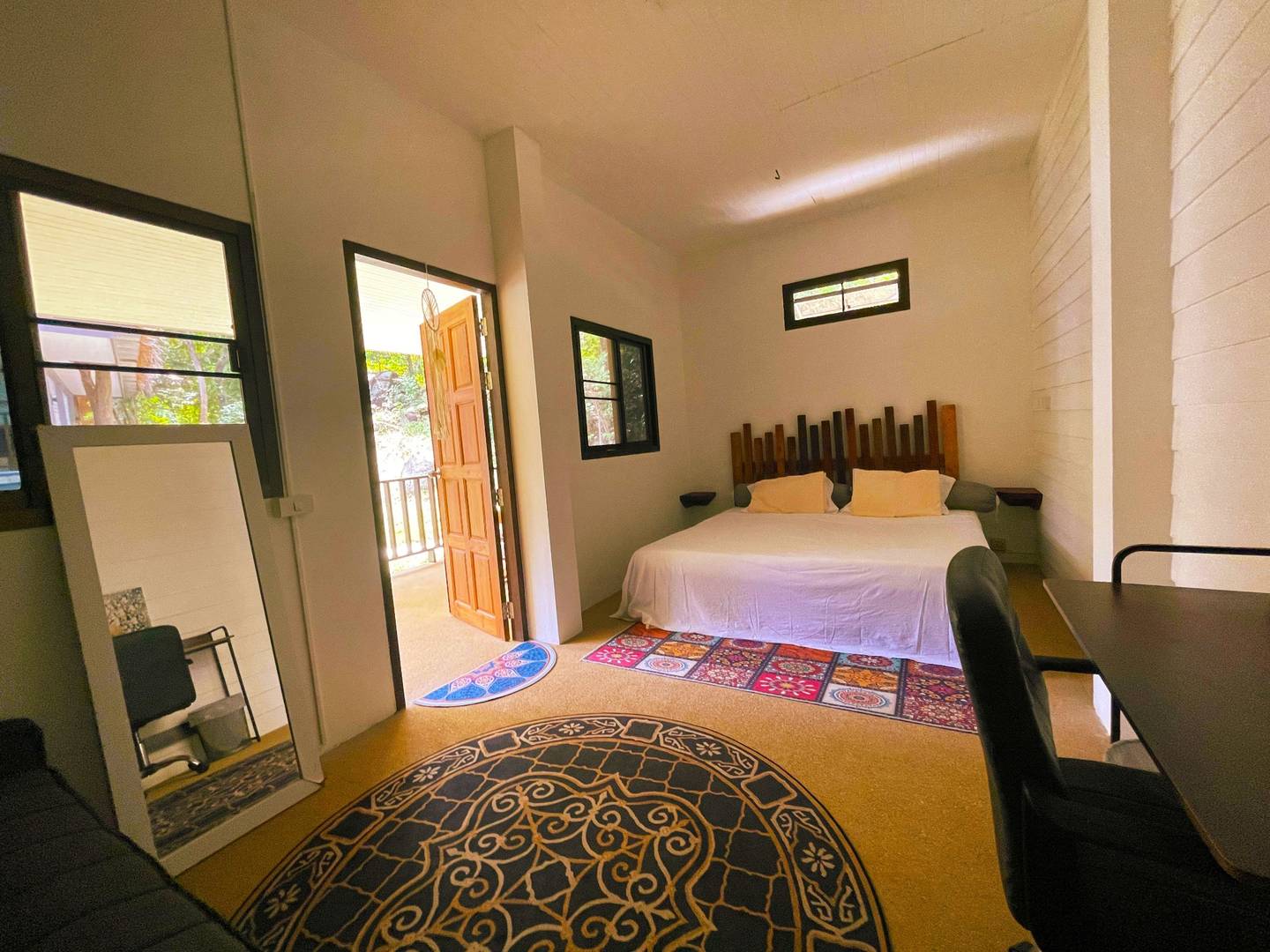 Interior of the Creator's Room guestroom – Canopy Village